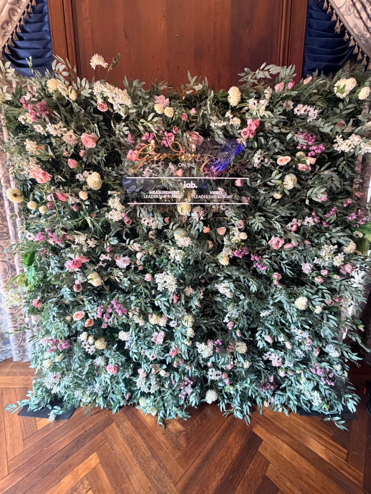 Eucalyptus and blush rose garden wall dressed for a summit reception