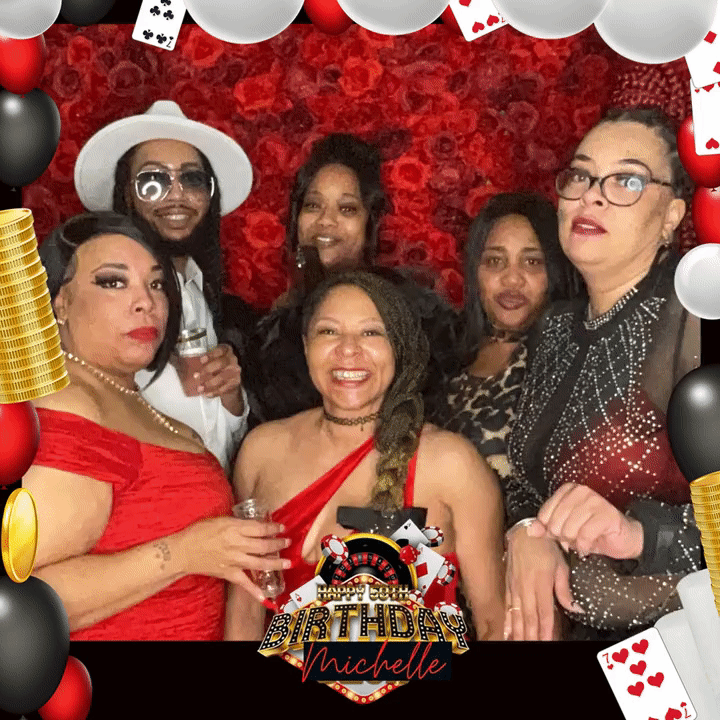 chell and cuzins in fromt of flower wall rental red flower wall rental for casino themed birthday party with group of friend dancing